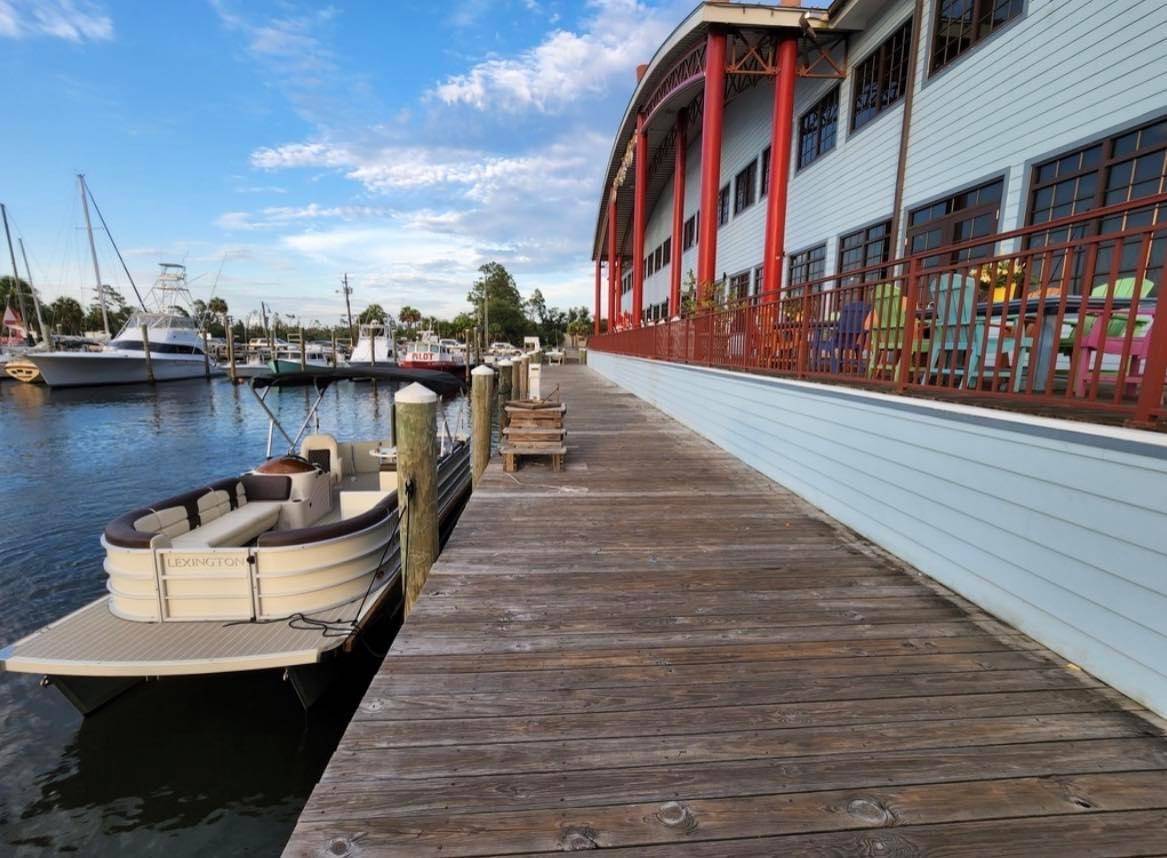 The outdoor boardwalk and docked boats at Capt. Anderson's Restaurant highlight its status among Panama City's most scenic waterfront restaurants.
